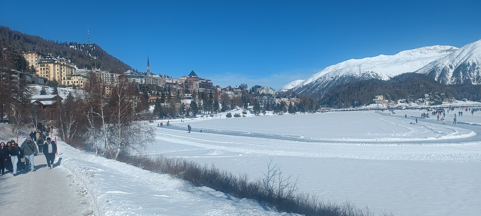 Frozen St. Moritz lake and village skyline